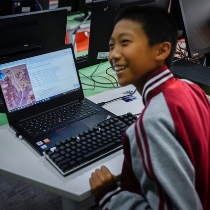 A boy is seen running code at a children’s computer coding training centre in Beijing in November of last year. More young connected users across China represent an expanded pool of consumers and upcoming internet-savvy workforce for the country’s technology sector. Photo: Agence France-Presse