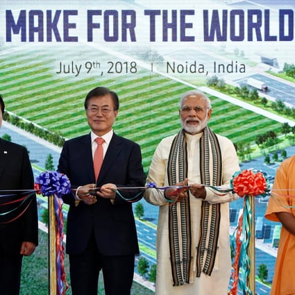 Indian Prime Minister Narendra Modi (second right) with South Korean President Moon Jae-in beside him, at the inauguration of Samsung’s smartphone factory in Uttar Pradesh in 2018. India has long nursed an ambition to be a world manufacturing hub. Photo: Reuters
