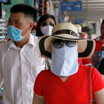 Vietnamese tourists visit Ha Long Bay. Photo: Reuters