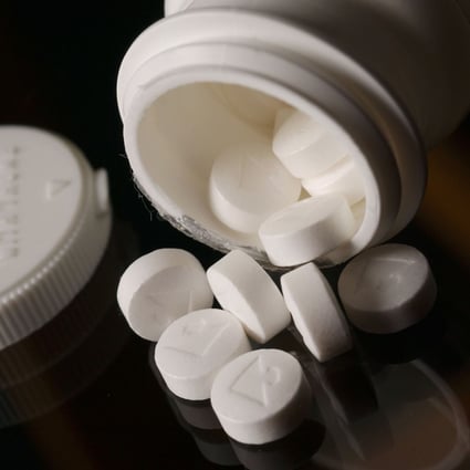 Aspirin tablets spill from a bottle. Photo: Handout