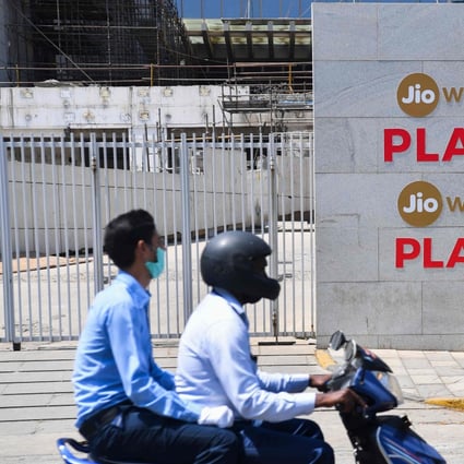 Motorists ride past the Jio World Centre during a government-imposed nationwide lockdown as a preventive measure against the spread of the Covid-19 coronavirus, in Navi Mumbai on April 22, 2020. Photo: AFP
