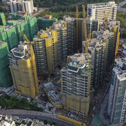 K Wah International’s Solaria project, in the yellow cladding in the middle, in Hong Kong’s Tai Po district. Photo: Martin Chan
