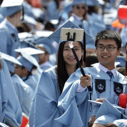 Chinese Graduates of Columbia University attend the commencement ceremony in New York City. Photo: Xinhua