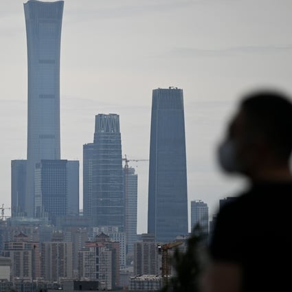 The skyline of the central business district in Beijing. economy is now widely expected to grow by between 1.5 per cent to 2.5 per cent in 2020. Photo: AFP