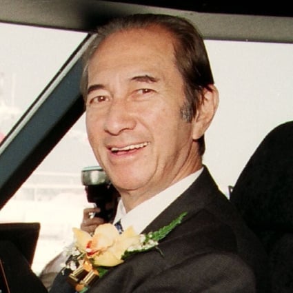 Stanley Ho, chairman of Shun Tak Holdings, taking the controls of the Barca, one of the foilcats (high-speed ferries) launched by Far East Hydrofoils, a subsidiary of Shun Tak Holdings, for the Hong Kong-Macau route, on November 20, 1995. Photo: SCMP