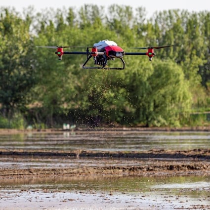 An XAG drone, attached with the company’s own JetSeed granule system, spreads rice seeds at a farm in the Zengcheng District of Guangzhou, capital of southern Guangdong province. Photo: Handout