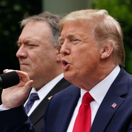 US President Donald Trump, with Secretary of State Mike Pompeo, during the briefing on China on Friday in the Rose Garden at the White House. Photo: AFP