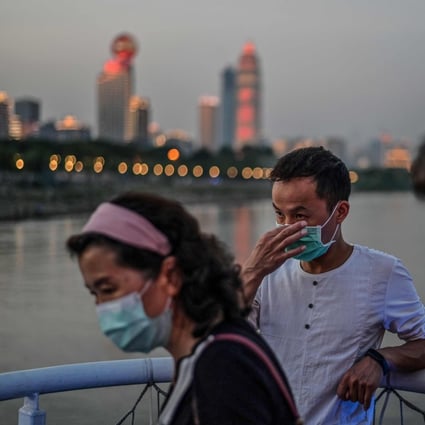 Warmer weather might allow for easing in some coronavirus measures in China, according to a top government adviser on the pandemic. Photo: AFP