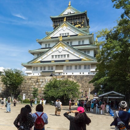 Tourists at Osaka Castle in Japan. Photo: Shutterstock