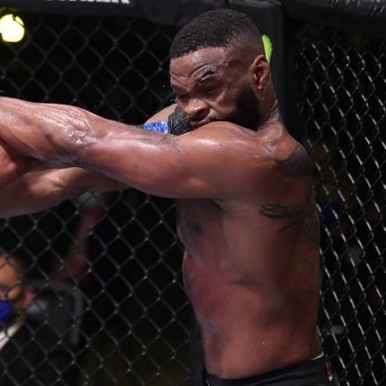 UFC welterweight Gilbert Burns punches former champion Tyron Woodley in their fight at UFC Fight Night in the Apex Arena, Las Vegas in May. Photo: USA Today