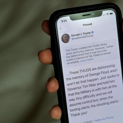 In this photo illustration a notification from Twitter appears on a tweet by US President Donald Trump that the social media platform says violated its policy on May 29, 2020 in San Anselmo, California. Photo: AFP
