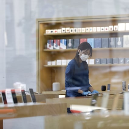 An employee prepares for the reopening of an Apple Store in the Omotesando district of Tokyo, Japan, on June 3. Apple plans to release its next iPhone line multiple weeks later than usual this year. Photo: Bloomberg