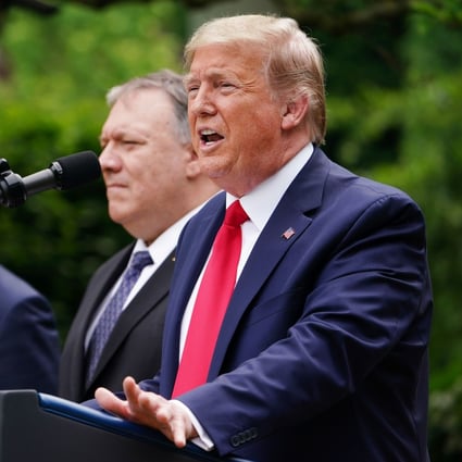 US Secretary of State Mike Pompeo, centre, looks on as President Donald Trump speaks during a press conference in the Rose Garden of the White House in Washington on May 29. Trump and Pompeo have publicly said Hong Kong is no longer sufficiently autonomous from China to receive special trade treatment from the United States. Photo: AFP