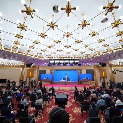 Simultaneous translation, in languages including English and French, is offered for a press conference given by Chinese Foreign Minister Wang Yi via video link in Beijing on May 24. Photo: Xinhua