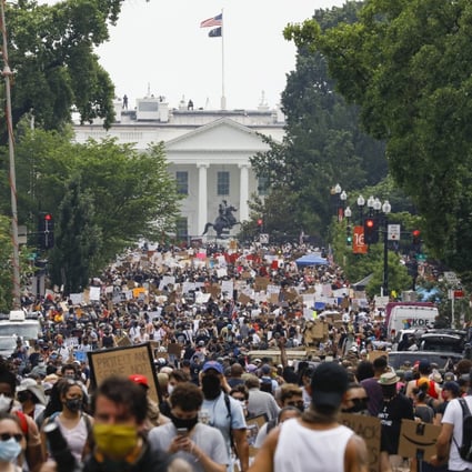 Demonstrators protest on Saturday near the White House in Washington. Photo: AP