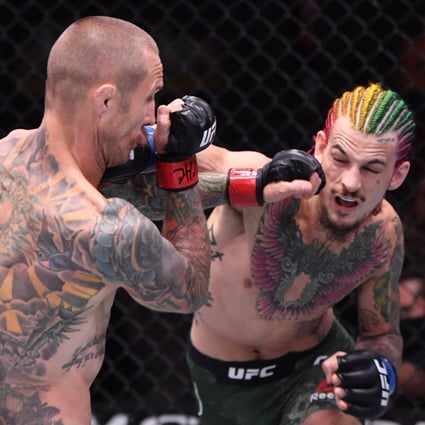 Sean O’Malley punches Eddie Wineland in their bantamweight bout during UFC 250. Photo: USA TODAY Sports