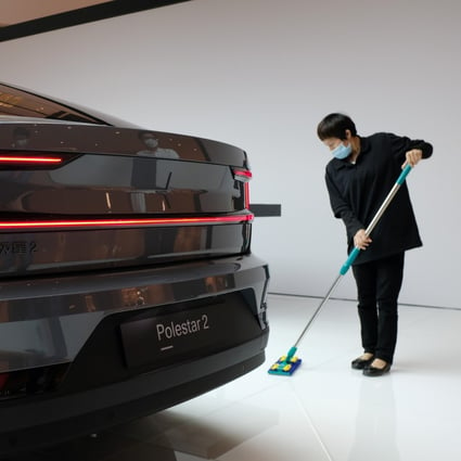 A Polestar 2 electric sedan is displayed at a shopping centre in Shanghai. The automobile sector has been boosted by supportive government policies aimed at the new energy vehicle segment. Photo: Reuters