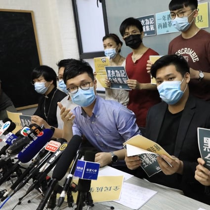 Ventus Lau (front row, left in blue) at a press briefing. Photo: May Tse