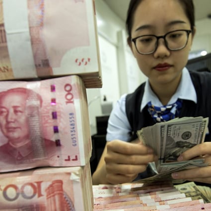 China has let the value of the yuan slip against the RMB index as tensions with the US grow and the economic outlook remains murky. Photo: AP