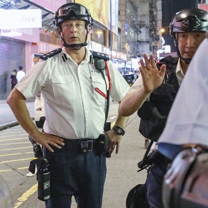 Assistant commissioner Rupert Dover in Mong Kok after a march against the extradition bill last July. Photo: Dickson Lee