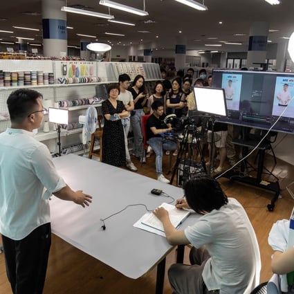 Employees rehearse hosting a livestream session for the upcoming Canton Fair inside a showroom at Ningbo MH Industry. Photo: Bloomberg