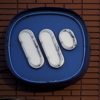 The Warner Music Group logo is displayed outside the company's headquarters in the Arts District neighbourhood of Los Angeles, California, on June 3. The group’s shareholders raised $1.93 billion in an initial public offering that ranks as one of the biggest US listings this year. Photo: Bloomberg