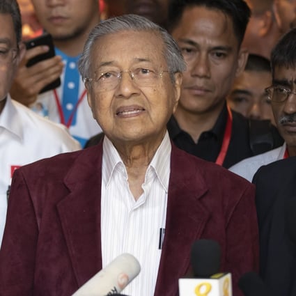 Mahathir Mohamad (right) in 2018, beside Muhyiddin Yassin, who replaced him as prime minister earlier this year. Photo: AP