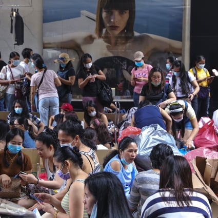 Domestic workers gather in Central on their day off on Sunday. Photo: May Tse