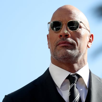 Former wrestler Dwayne ‘The Rock’ Johnson attends the ceremony honouring him with a star on the Hollywood Walk of Fame in 2017. Photo: EPA
