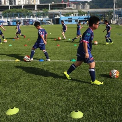 Where can Hong Kong football go? Young footballers train at Jockey Club Kitchee Centre in Shek Mun. Photo: David Wong
