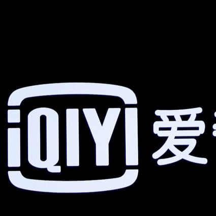 The logo for Chinese streaming platform iQiyi is displayed on a screen during the company's IPO at the Nasdaq Market Site in New York City in 2018. Photo: Reuters