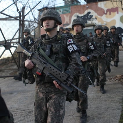 South Korean soldiers leaving a guard post near the Demilitarised Zone. Photo: EPA