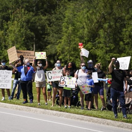 Children and families during a rally and short march in support of Black Lives Matter at Al Lopez Park, Tampa, Florida on Friday. Photo: Tampa Bay Times via ZUMA Wire/dpa