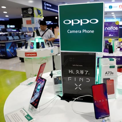 Oppo smartphones are displayed in a shop in Singapore. Photo: Reuters