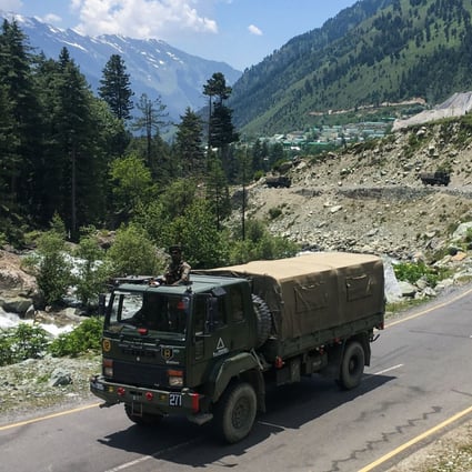 An Indian army convoy makes its way towards the border with China. Photo: AFP