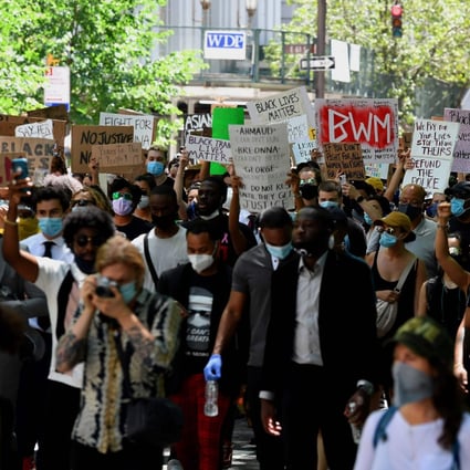 Protesters march on Fifth Avenue in New York on June 12 to protest against police brutality and racial inequality in the aftermath of the death of George Floyd. Photo: AFP