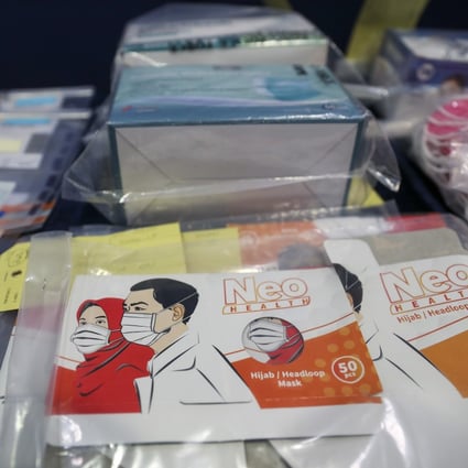 Hong Kong police arrested 31 people for cheating 400 victims out of more than HK$3 million in the latest operation against face mask scams, April 20, 2020. Photo: SCMP / Dickson Lee