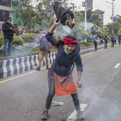 A Nepali activist burns an image of Indian Prime Minister Narendra Modi during a May protest against India’s unilateral construction of a link road that passes through some territories also claimed by Nepal. Photo: EPA