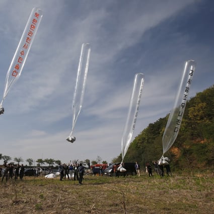 Members of defector organisation Fighters for Free North Korea release balloons carrying anti-Pyongyang leaflets across the border in this 2016 file photo. Photo: EPA