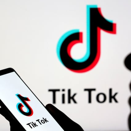 A person holds a smartphone with Tik Tok logo displayed in this picture illustration taken November 7, 2019. Photo: Reuters
