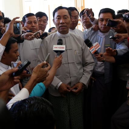 Shwe Mann speaks to media outside the first session of the new parliament in 2016. Photo: Xinhua