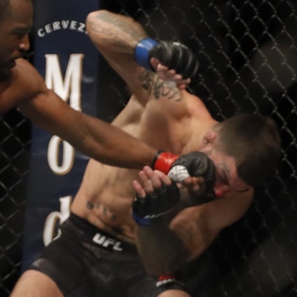 UFC welterweight contender Geoff Neal lands a punch on Mike Perry at UFC 245 in the T-Mobile Arena, Las Vegas in December 2019. Photo: AFP