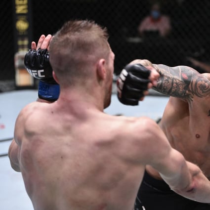 Dustin Poirier throws a punch at Dan Hooker during UFC Fight Night at the UFC APEX. Photos: USA Today