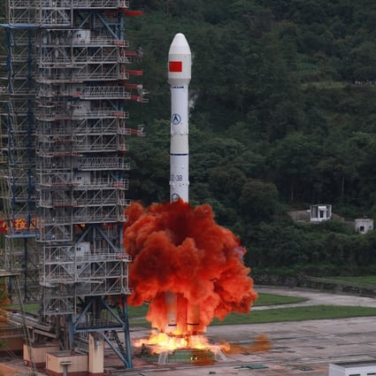 A carrier rocket carrying the last probe for China’s BeiDou satellite navigation system blasts off on Tuesday. Photo: Xinhua