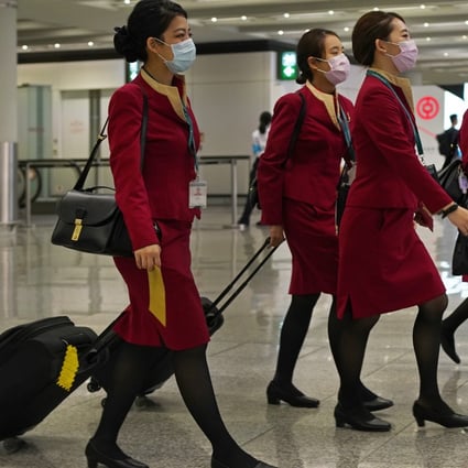 Cathay Pacific flight attendants at Hong Kong’s airport. The aviation industry has been hammered by the Covid-19 pandemic. Photo: AP