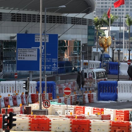 Water barriers have been placed on roads leading towards Golden Bauhinia Square in Wan Chai, where the July 1 flag-raising ceremony marking the handover from Britain will be held. Photo: Dickson Lee