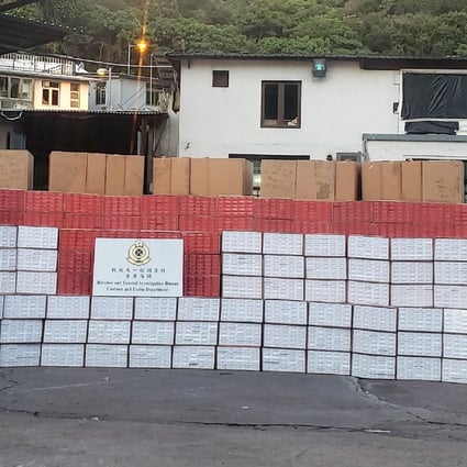 Hong Kong customs officials seized about 22 million illicit cigarettes with an estimated market value of HK$59 million on Monday, the latest in a series of massive hauls this year. SCMP: Handout