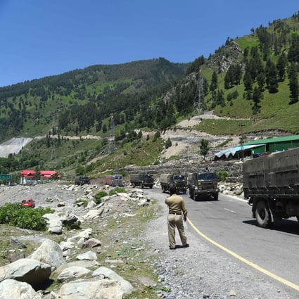 Indian army trucks travel along a highway leading to Ladakh, in Jammu and Kashmir, on Monday. Photo: EPA-EFE