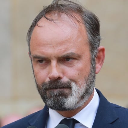 Outgoing French prime minister Edouard Philippe looks on during the handover ceremony in the courtyard of the Matignon Hotel in Paris on Friday. Photo: AFP