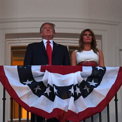 US President Donald Trump and first lady Melania Trump stand in the Truman Balcony at the White House as they host the 2020 ‘Salute to America’ event. Photo: AFP
